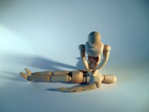 Wooden figures modeling CPR