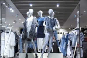 Female mannequins inside women's clothing store