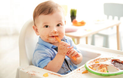 Messy baby eating