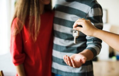 Couple getting keys to new home