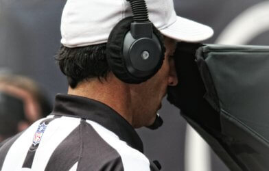 NFL Referee Looking at Instant Replay