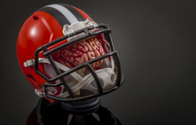 Football helmet over brain: concussions and head injuries