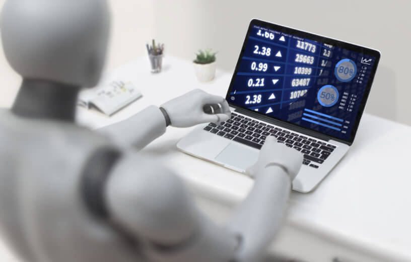 Robot financial advisor on computer