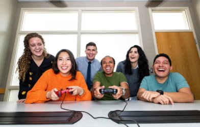 Office workers playing video game