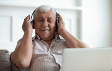 Older man listening to music