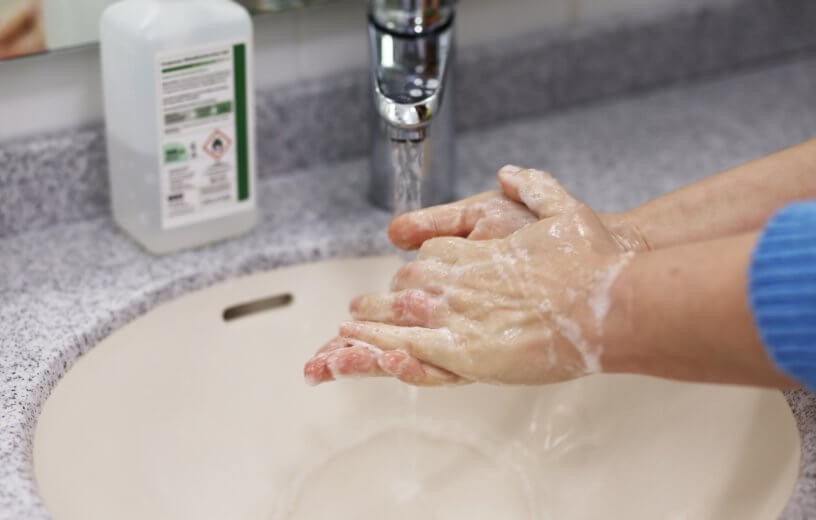 Person washing their hands