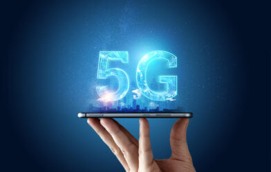 5G network hologram above smartphone
