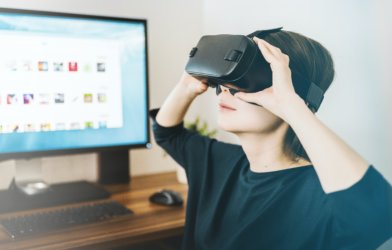 Woman using virtual reality goggles