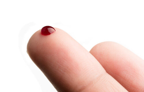 Drop of blood on finger