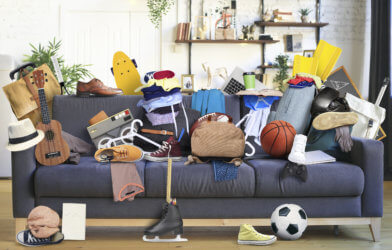 Messy house: Couch filled with junk